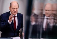 Шольц выступил против создания торговых барьеров